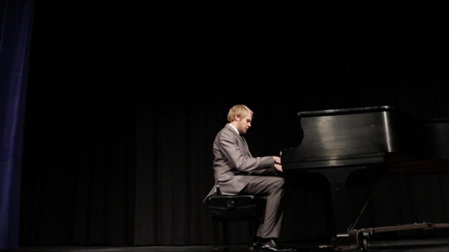 UW-Stout student Lukas Medin plays piano in a scene from the film “Oh, The Places You’ll Go!” The film, based on a Dr. Seuss story and created by Medin and three other students