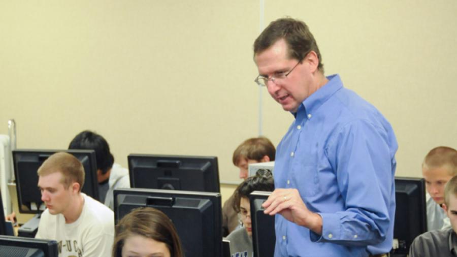 Professor Terry Mason works with an applied mathematics and computer science student at UW-Stout