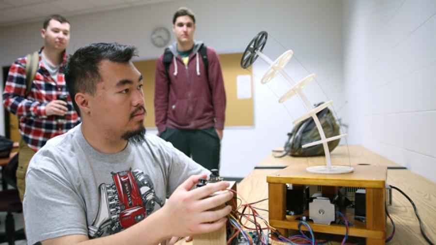 UW-Stout engineering students work on a robotics project last spring.