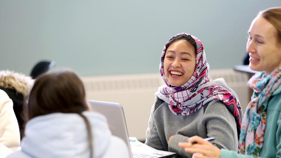 Students participate during an English as a second language class at the ESL Institute.