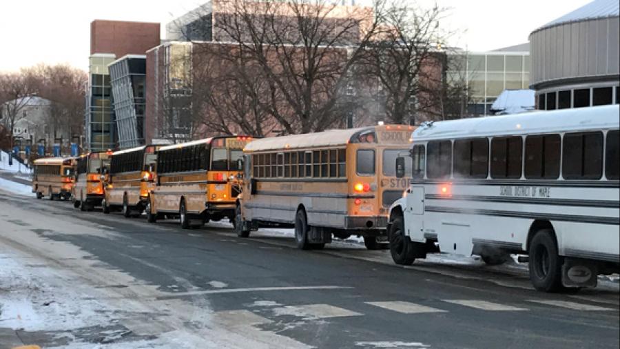 Buses drop off high school students at UW-Stout for the 46th annual DECA District One Career Development Conference.