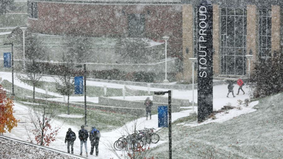 Students walk past the Memorial Student Center during a recent snowfall.