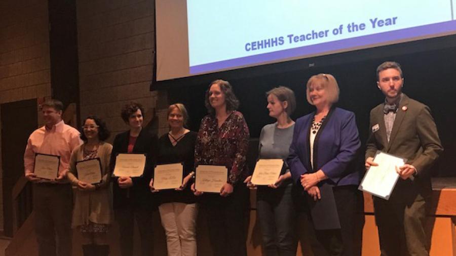 Teachers of the Year, from left, Kevin Mason, Karen Ostenso, Amanda Barnett, Mary LaRue, Kathryn Hamilton, Julie Maves-Bates, Carol Johnson and Matthew Giguere.