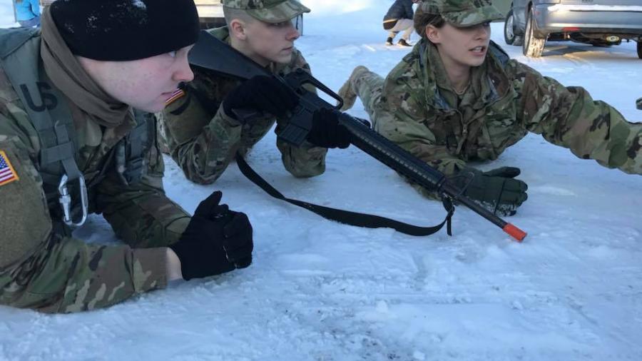 ROTC students prone in the snow.