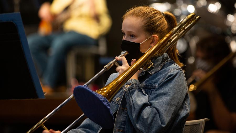 Trombonist Jamie Anderson practices with the Jazz Orchestra this fall.
