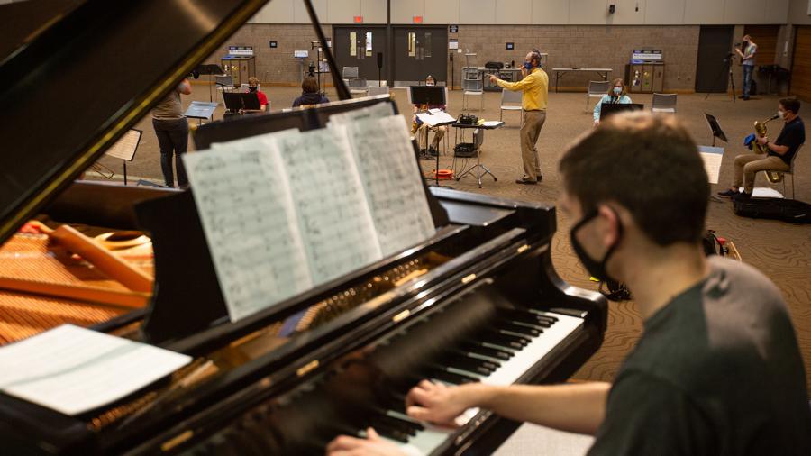 Pianist Nathan Roalkvam plays during practice this fall in the Great Hall of the Memorial Student Center.