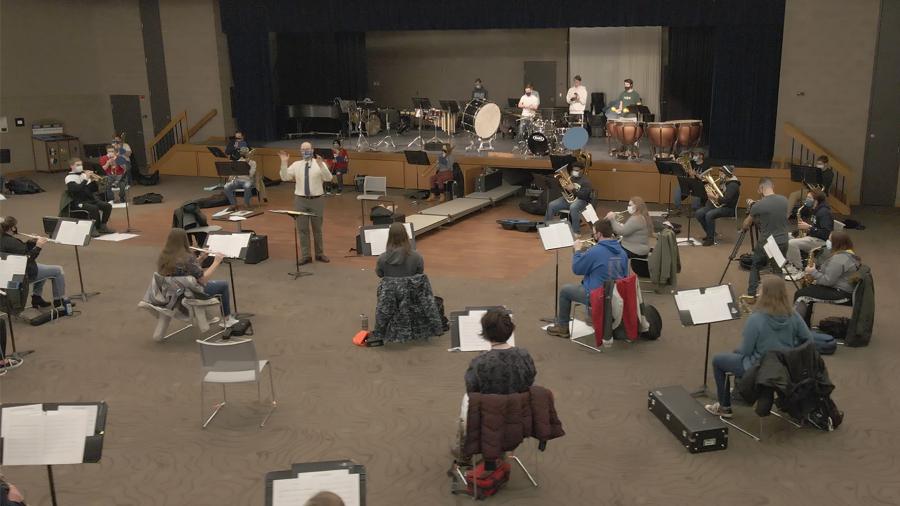 The UW-Stout band performs for the video in the student center.