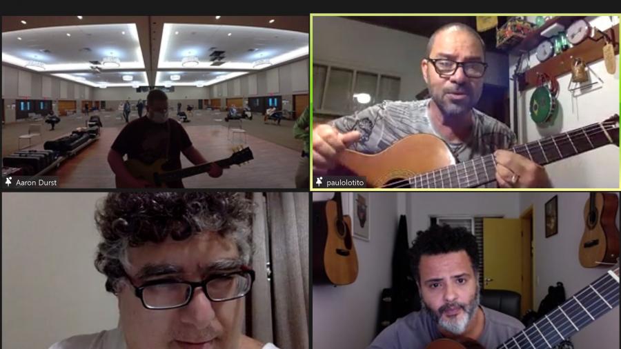 Paulo Padilha, upper right in selected frame, performs with his Brazilian band.