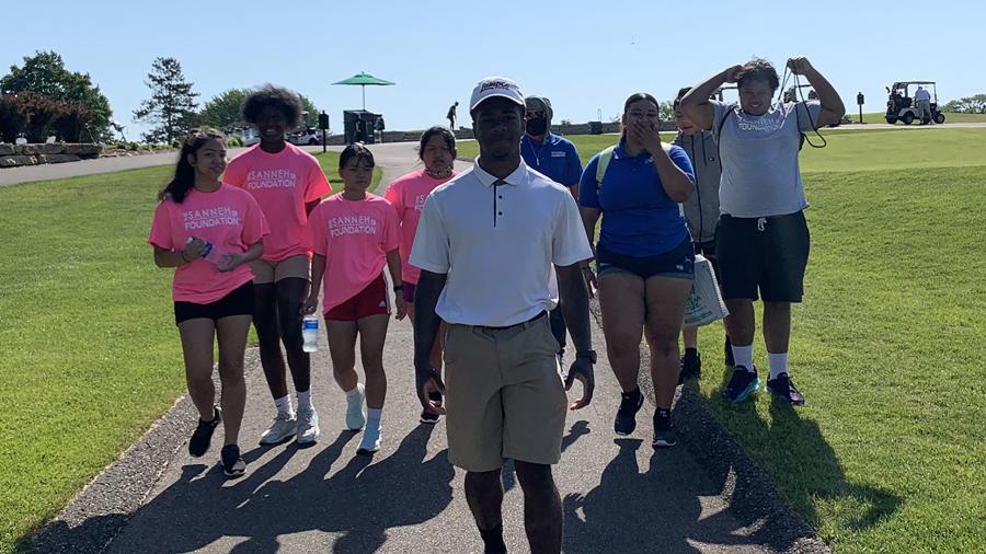 Derek Turner III, front, is an intern with At the Turn and captain of the Accelerate Hospitality program.