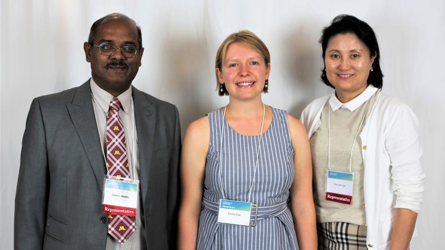 Emma Sisk, center, receives a UW-Stout scholarship in 2018, with scholarship representative Kumar Mallikarjunan, left, and faculty member Eun Joo Lee.