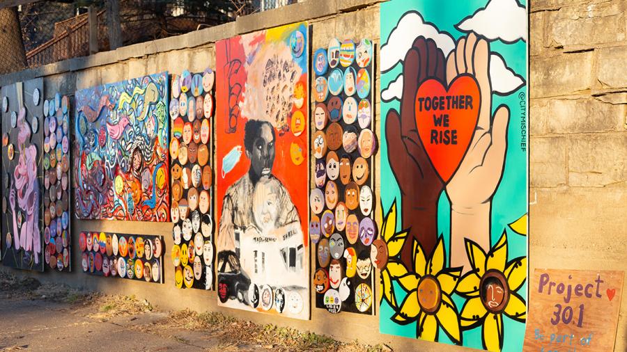 The mural contains artwork from artists to remember George Floyd and raise awareness about social injustice and racial inequalities