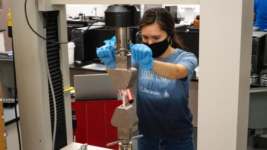 Plastics engineering major Olivia Hile works in a lab in 2020.