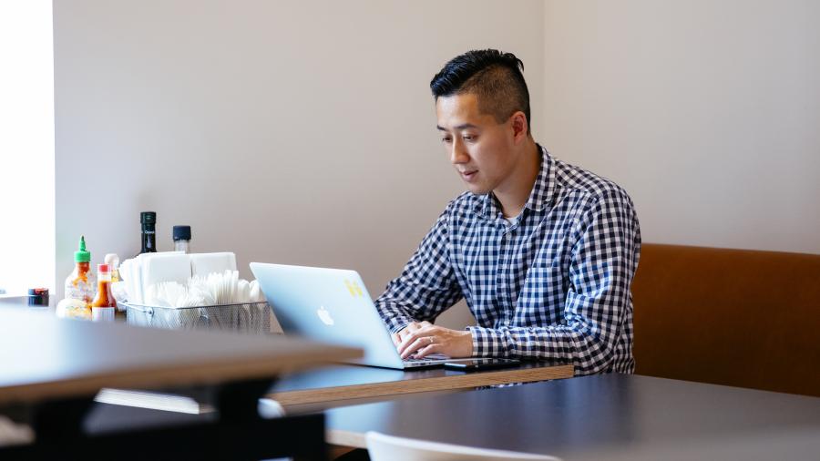 Student at a laptop.