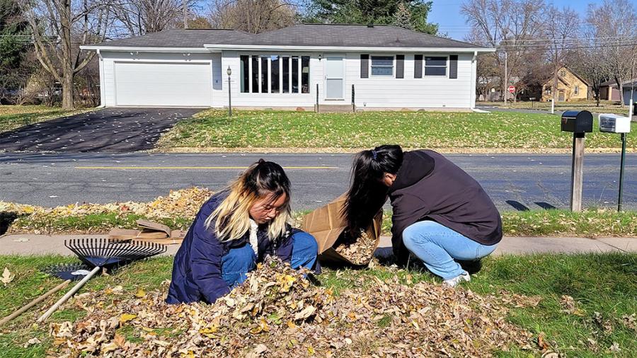 Students helping with community fall clean up.