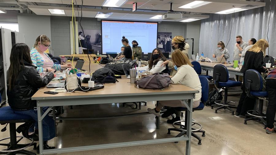 Students in a fashion and retail class work recently in the new Makers Laboratory in Fryklund Hall.