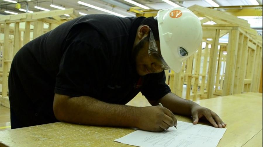 Josh Carr, a project manager for general contractor Kraus-Anderson in Minneapolis, works in a UW-Stout lab while an undergraduate in UW-Stout’s construction program.