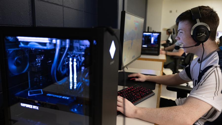 UW-Stout esports team players compete from their new arena in Heritage Hall. The arena includes new computers, monitors and chairs that are standard in competitive gaming.