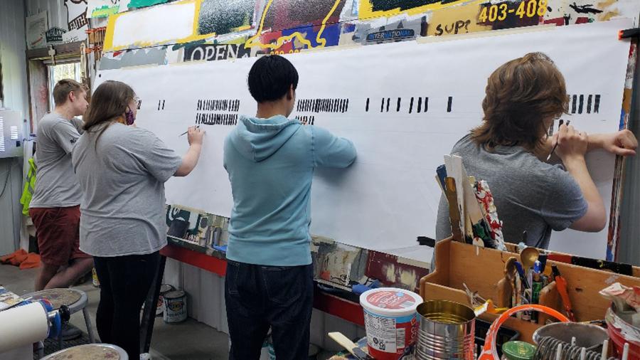 Students practicing at Vintage Sign Shop