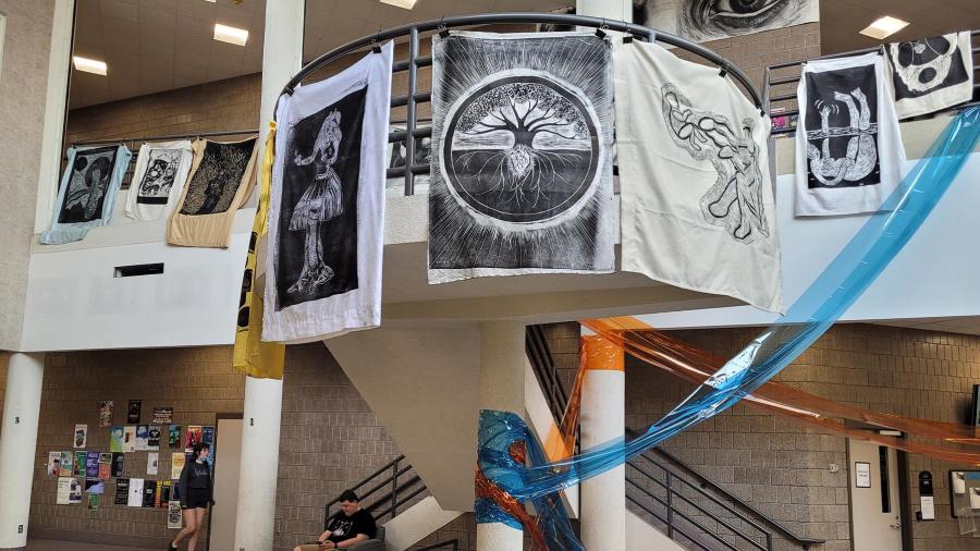 Steamroller prints on display in the atrium outside of Furlong Gallery.