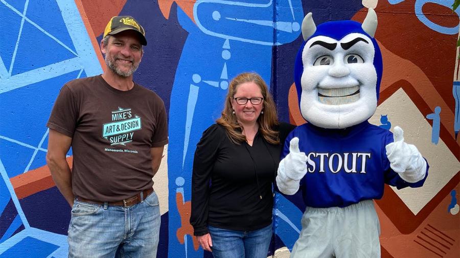 Lecturer Wade Lambrigtsen and Professor Cynthia Bland with Blaze the Blue Devil