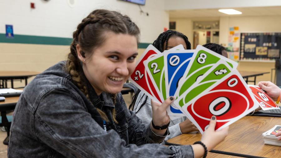 Jazmine Williams plays a game with students at the club.