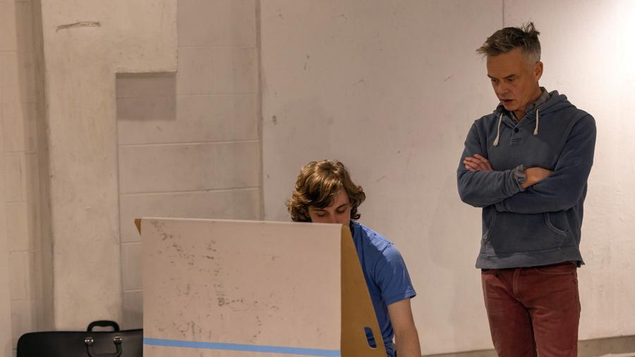 Tozer, who has taught at UW-Stout for 13 years, observes one of his students working in the Drawing I class.