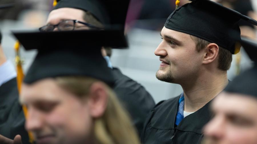 Ben Larson celebrates at commencement.