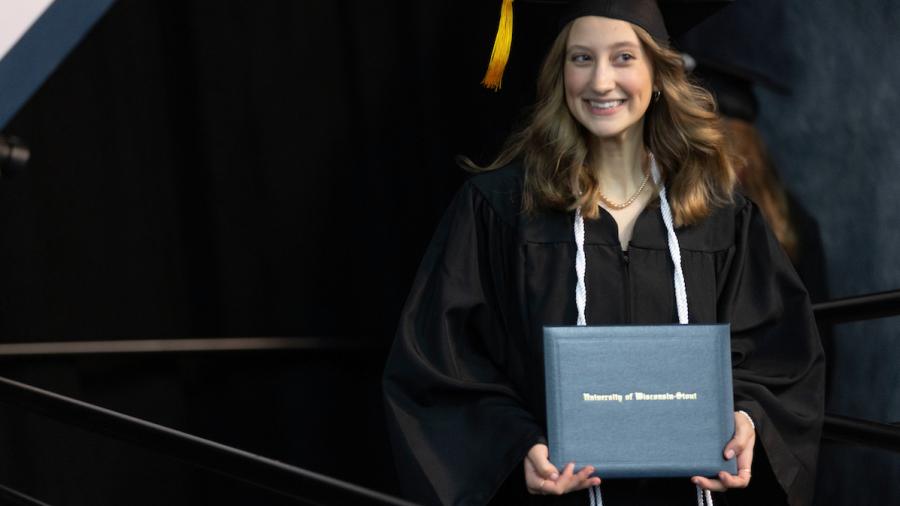 Rachel Croft celebrates at commencement.