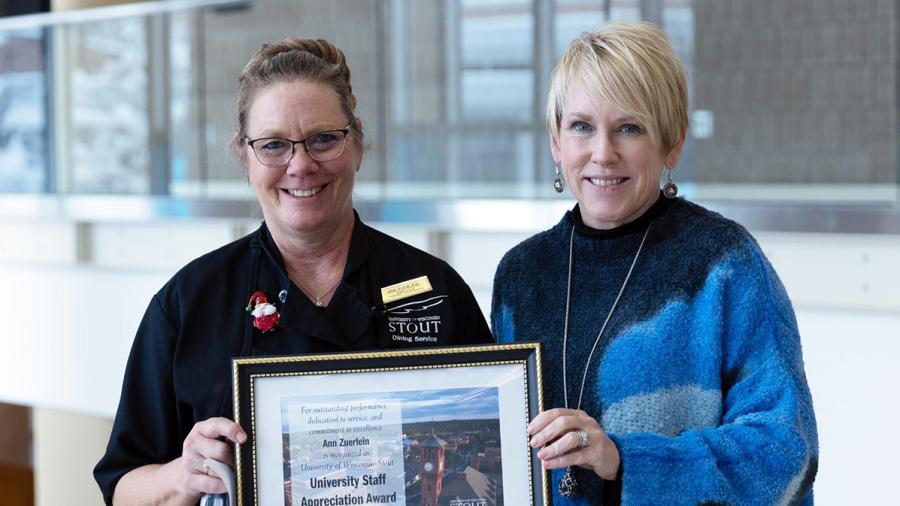 Ann Zuerlein, left, receives the December University Staff Employee Appreciation award from Chancellor Katherine Frank.