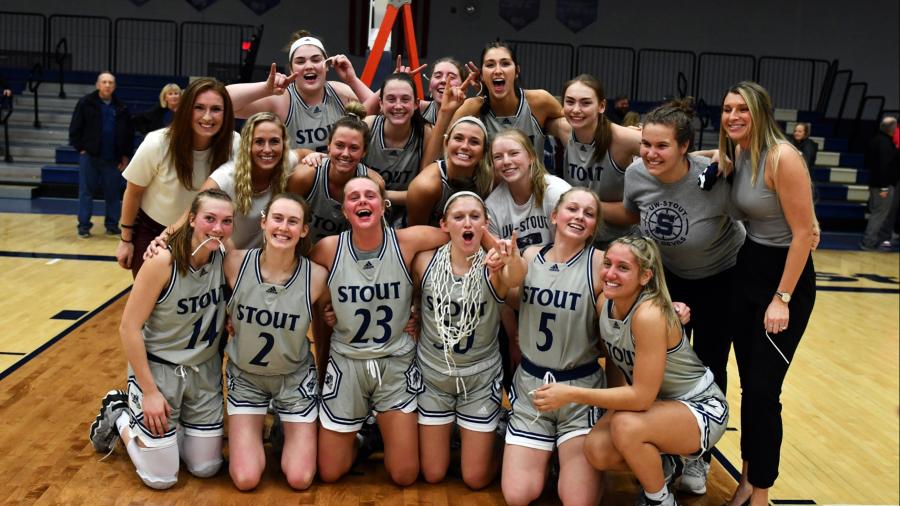 The Blue Devils celebrate their win Feb. 15 over UW-Eau Claire to earn a share of the WIAC championship.