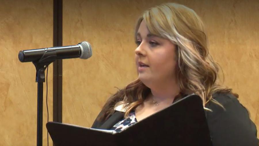 Ashley DeMuth, of the Menomonie Chamber of Commerce, speaks at the hearing in Wisconsin Dells. 