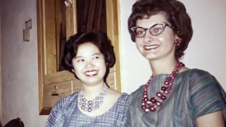 Sharon Balius and her senior year roommate, Emily Shu from Hong Kong, visit during a campus international dance.