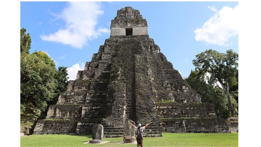 Paige Letter at the base of Temple 1, in Tikal National Park. Photo by Paige Letter