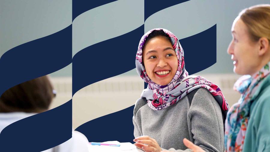 ESL student engaging with instructor.