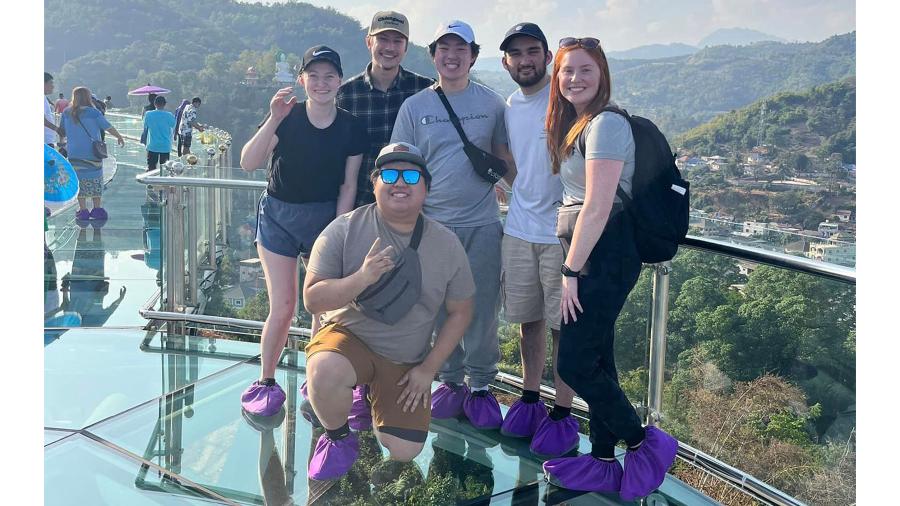 Students at the Mai Sai Skywalk in Thailand