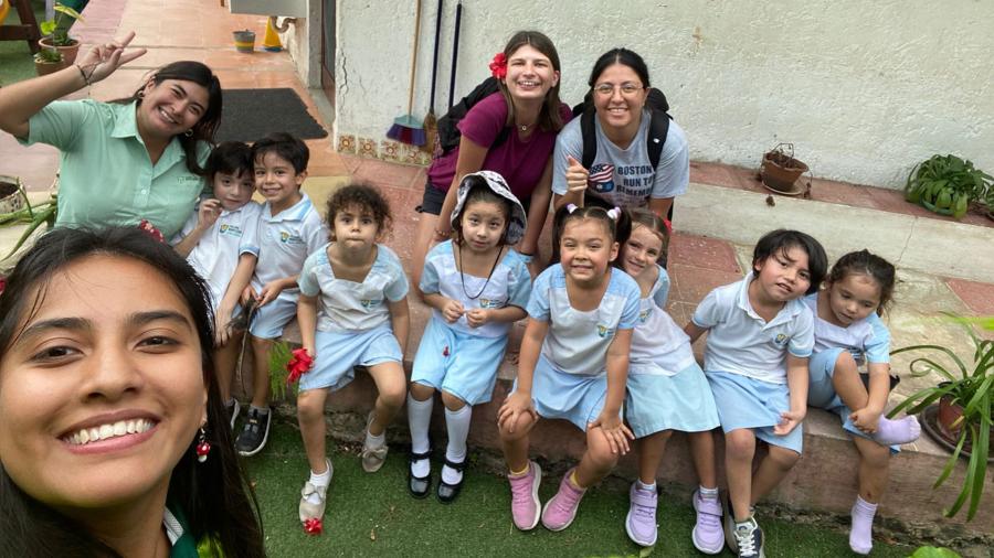 Sara Christians with prekindergartners and teachers