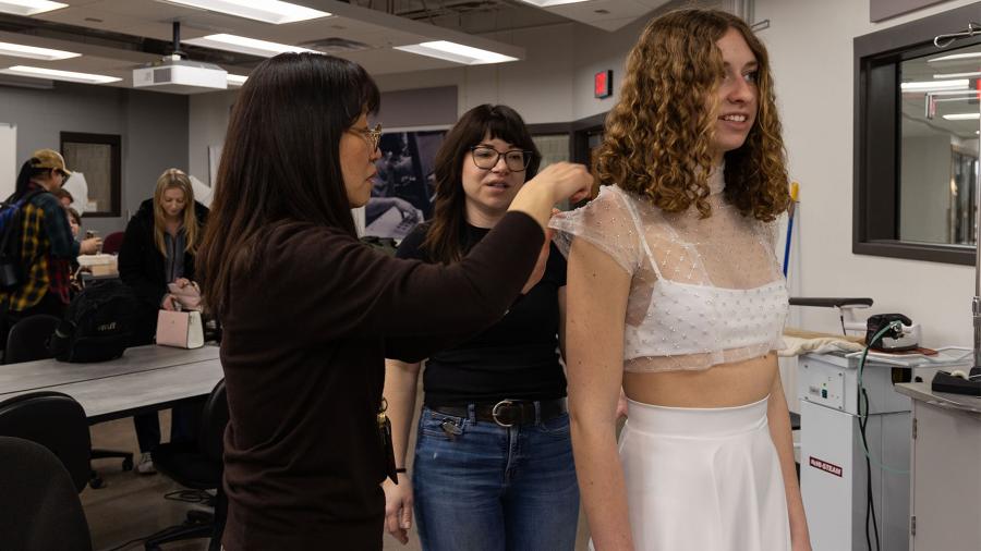 Reem Emerson, center, in the fashion design lab