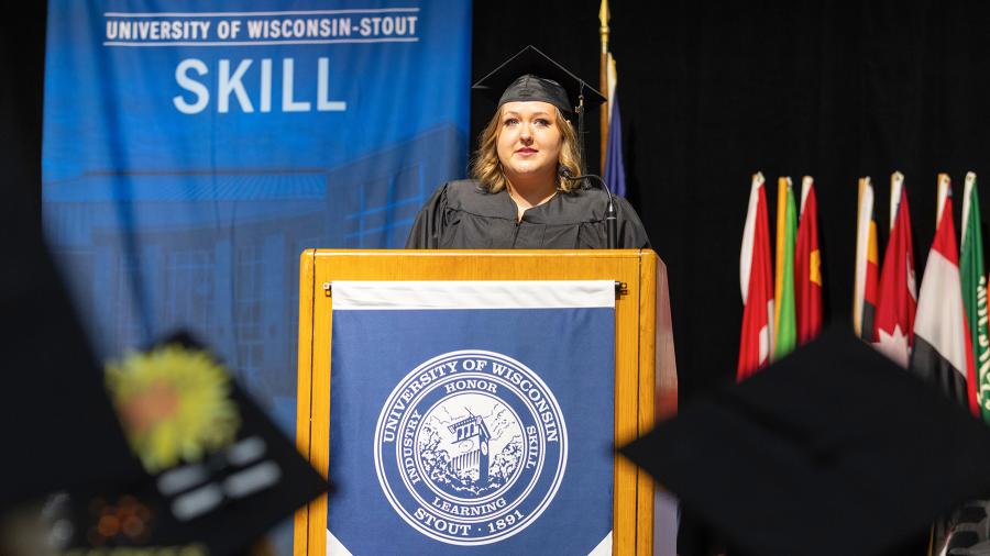 Sarah Jasa, who received a master’s degree, speaks during the Graduate Studies ceremony.