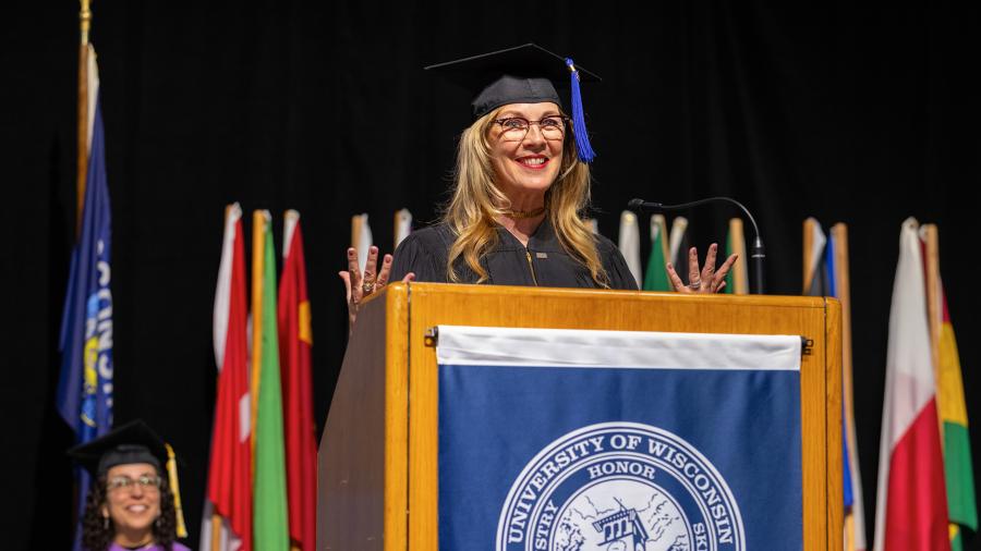 Alum Shelly Ibach, a 1981 graduate and now CEO of Sleep Number, speaks during commencement.