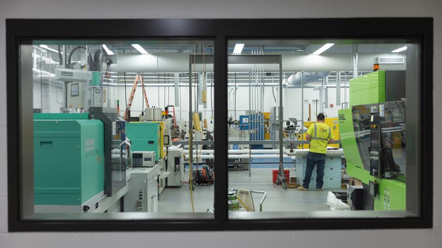 New hallway windows allow passers-by to view what students are working on in the new Plastics Engineering Lab.