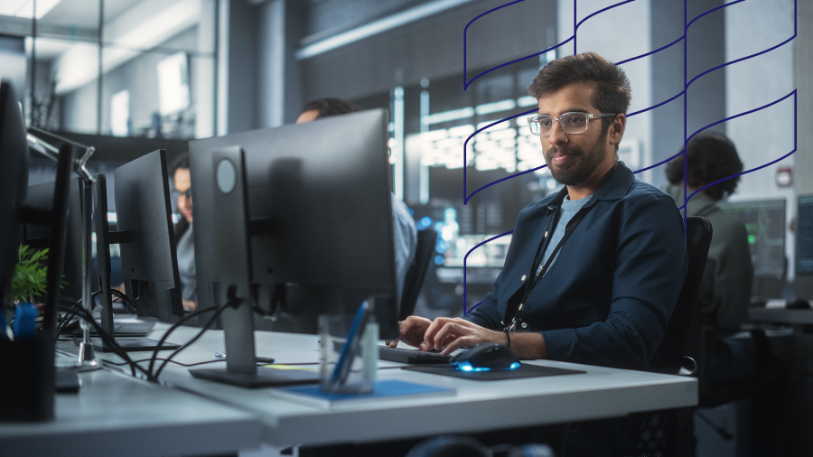 Professional at work in an office setting using computing to advance this area of expertise.