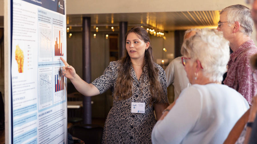 An environmental science students explains critical research around the impact of water quality issues on local residents.