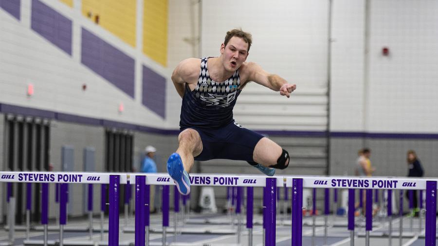 Brandon Dick clears a hurdle in competition as a member of UW-Stout's track and field team.
