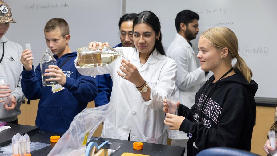 Mridini Upadhyay works with Menomonie High School students during a STEAM Camp