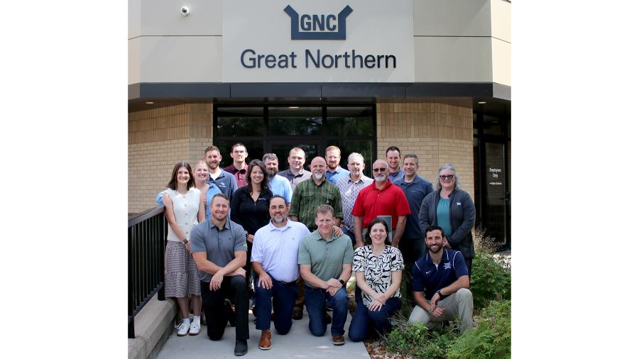 A group of alumni at their employers, Great Northern Corporation