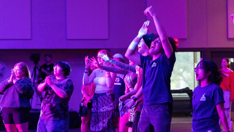 Students dance at an involvement fair