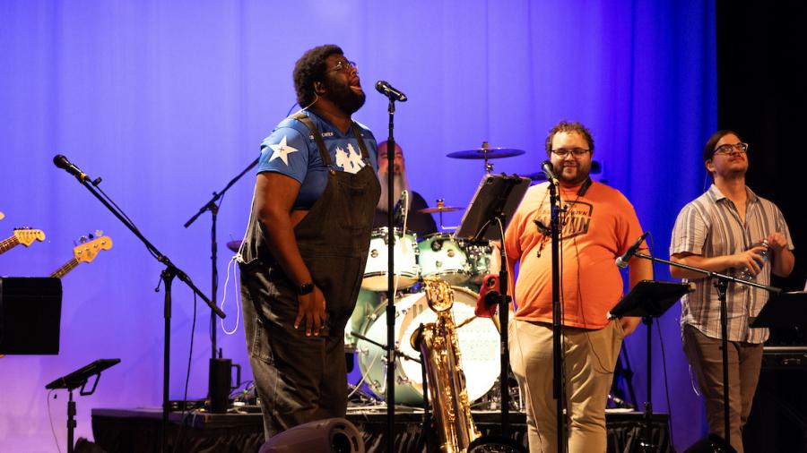 A band performs at an involvement fair