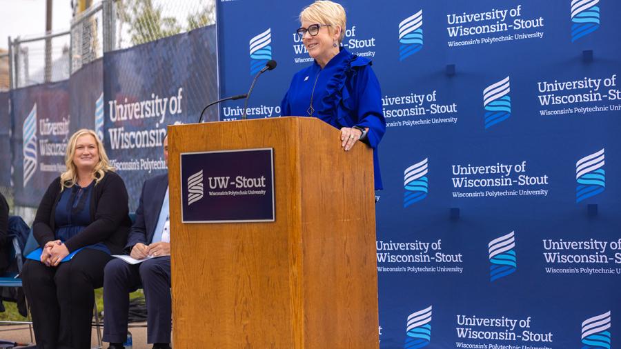 Woman at a podium