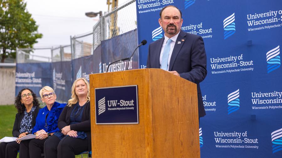 Man in suit at podium
