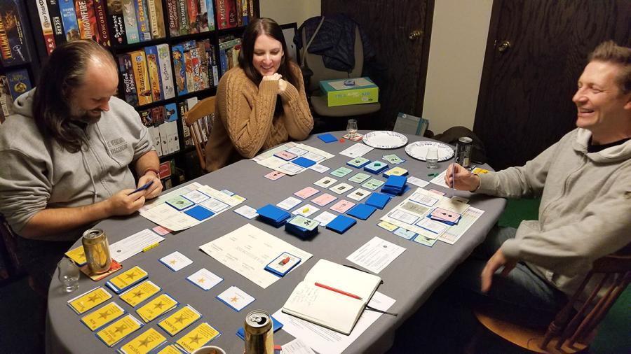People playing a board game